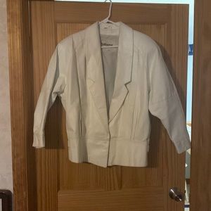 Vintage Wilson’s white leather jacket.